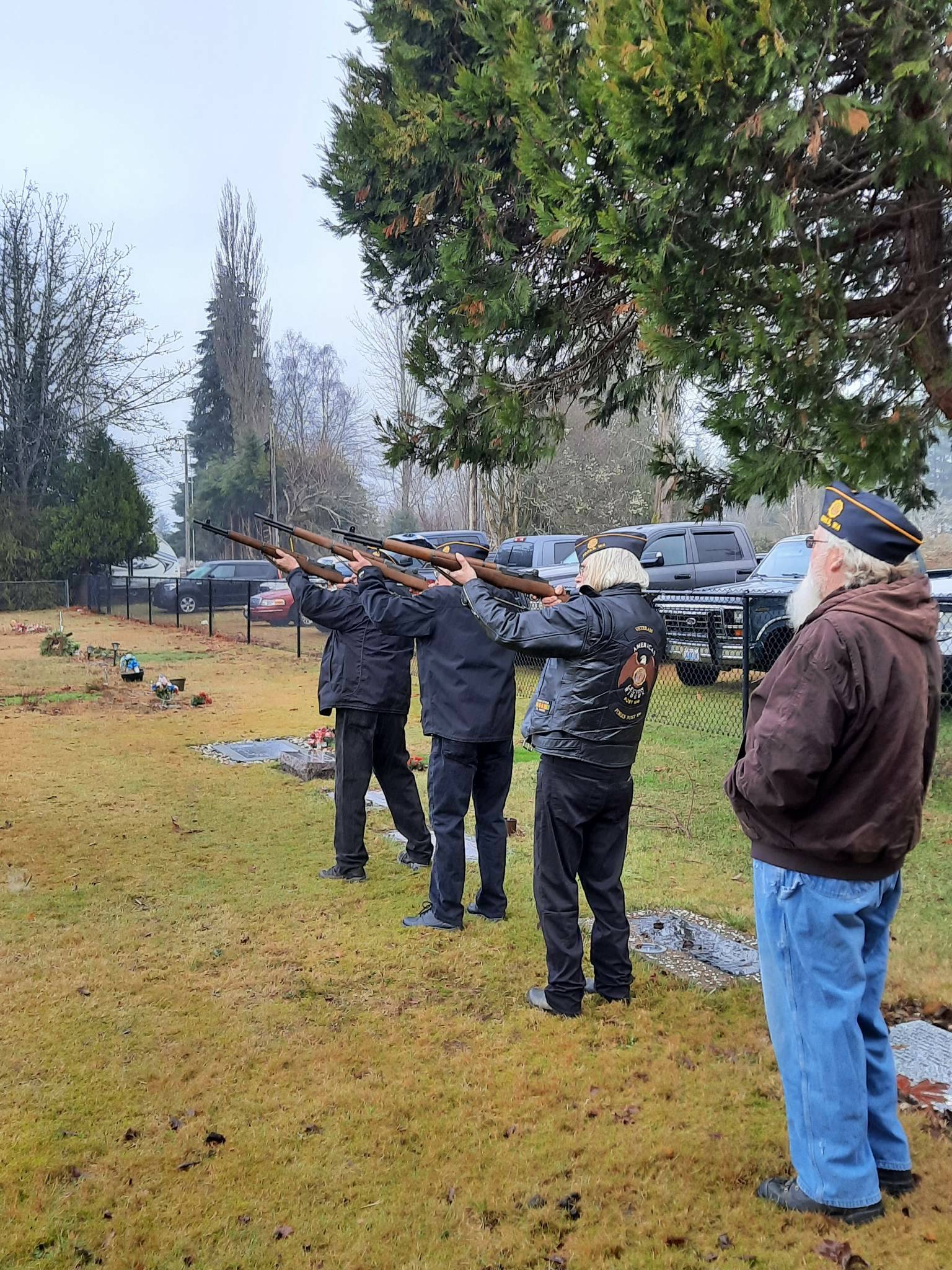 Pastor Warren Johnson started and ended the ceremony with a prayer. Greta Christianson, with the Micheal Trebert Chapter of DAR, spoke about wreaths across America. Members of the Forks American Legion offered a 21-gun salute (3 guns 7 volleys) Commander Bubba Bolin gave the command. Meg Rasmussen played taps after. Those present helped place the wreaths.