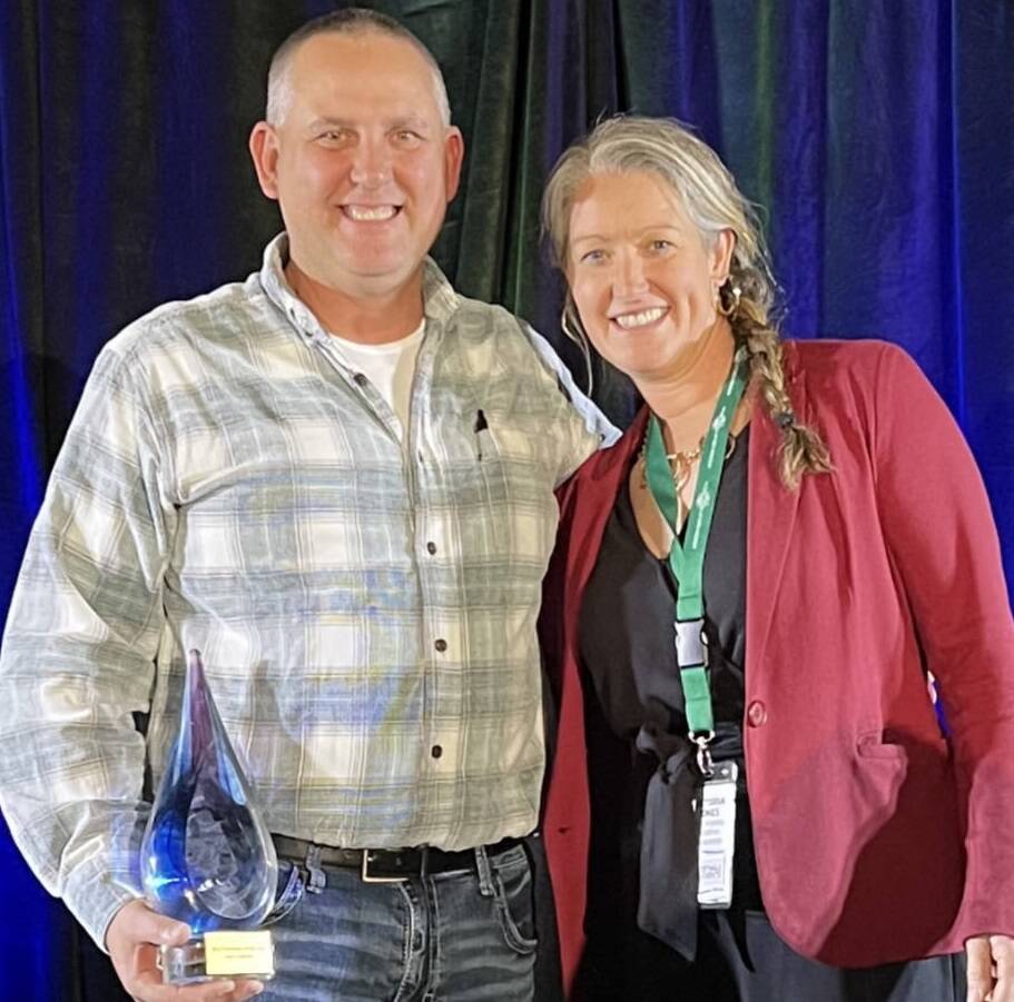 Sean Coleman, Washington Festivals Events Association’s 2022 Washington State Volunteer of the year, celebrates the honor with Victoria Jones, executive director of Port Angeles Marathon Association, recipient of Best of Show for the Run the Peninsula series, at WFEA’s annual awards dinner on Nov. 2 in Bellevue. Submitted Photo