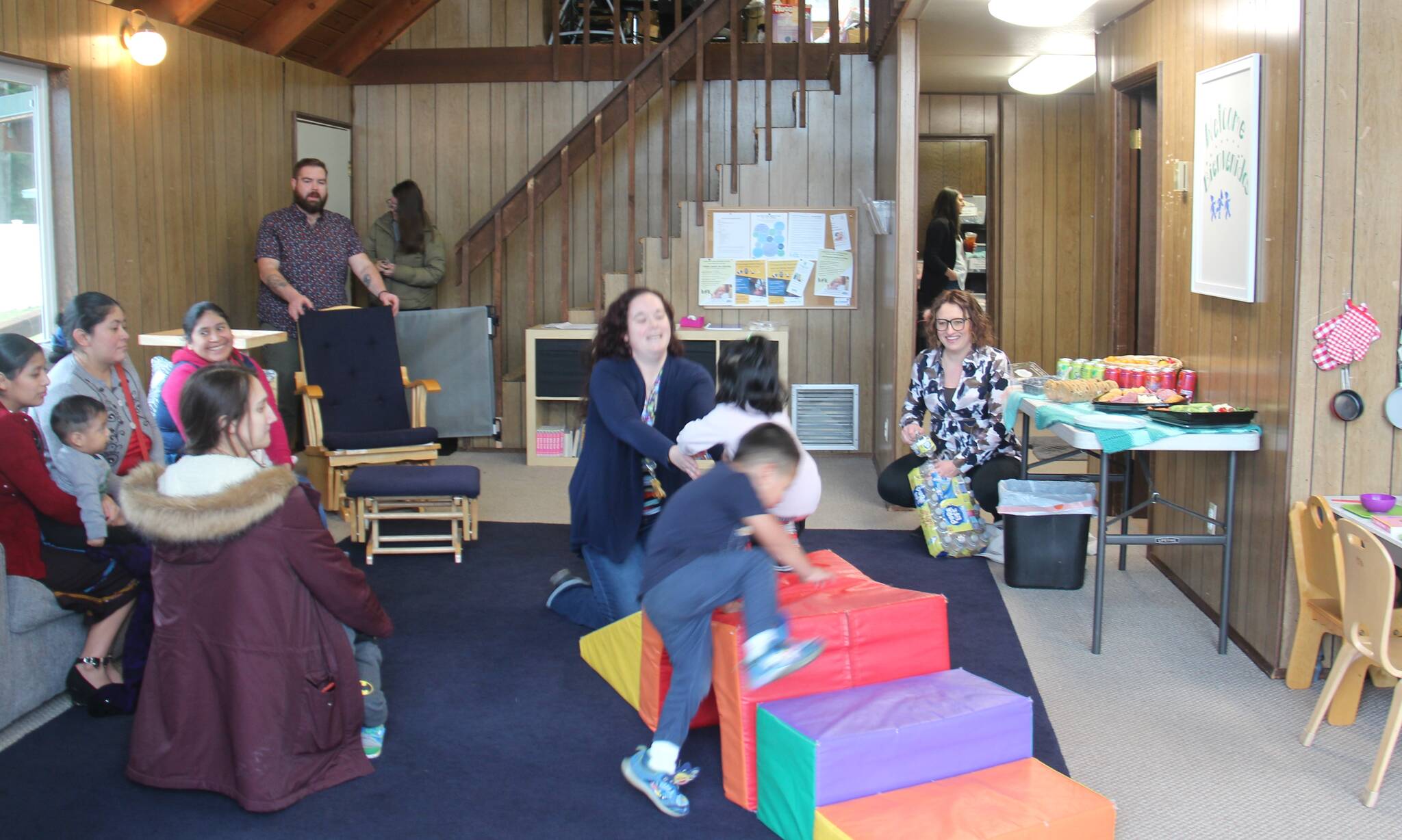 The new office features a play area as well as a small conference room; as well as clothing and shoes and diapers that clients can access for free. Photo Christi Baron