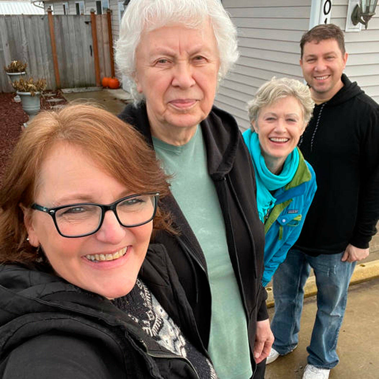 Photo courtesy North Olympic Regional Housing Network/ Last week, officials with the North Olympic Regional Housing Network officially purchased a Sequim home to help house at-risk/homeless veterans. Here, from left, Cheri Tinker, executive director of the housing network; Helen Starr, executor with her husband Greg (not pictured) of Lt. Colonel James Minsky’s estate; real estate agent Nell Clausen with RE/MAX Prime, and John Koch with the U.S. Coast Guard snap a celebratory photo of the purchase.