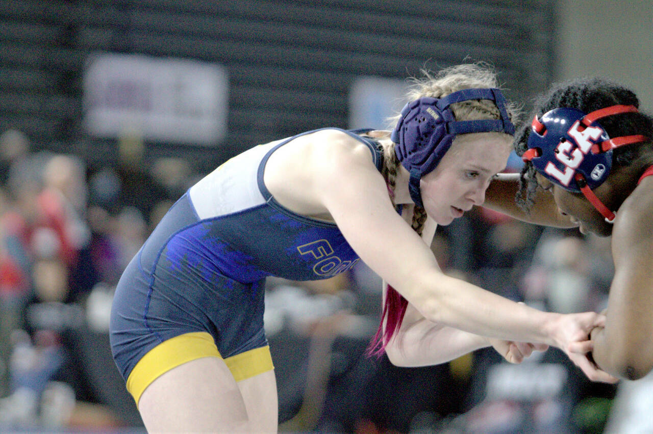 Forks’ Miley Blanton wrestles against Life Christian’s Tebisi White at the Mat Classic. Blanton finished sixth at 120 pounds. (Courtesy of Steven Powell)