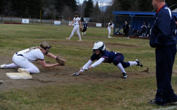Kadie Wood makes the play at third for the out. Photos Lonnie Archibald