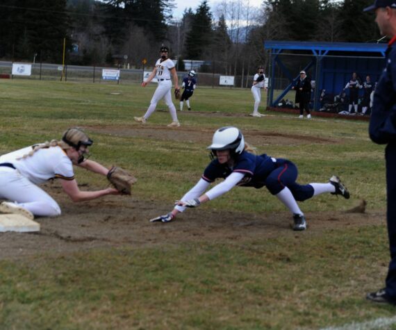 <p>Kadie Wood makes the play at third for the out. Photos Lonnie Archibald</p>