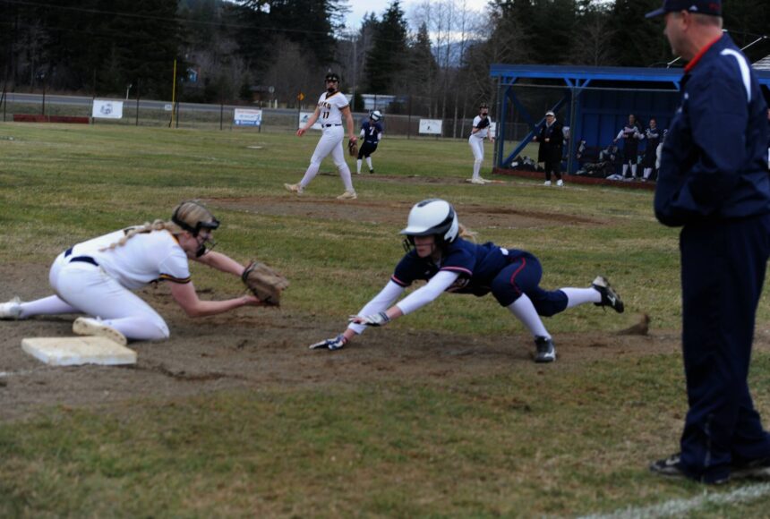 <p>Kadie Wood makes the play at third for the out. Photos Lonnie Archibald</p>