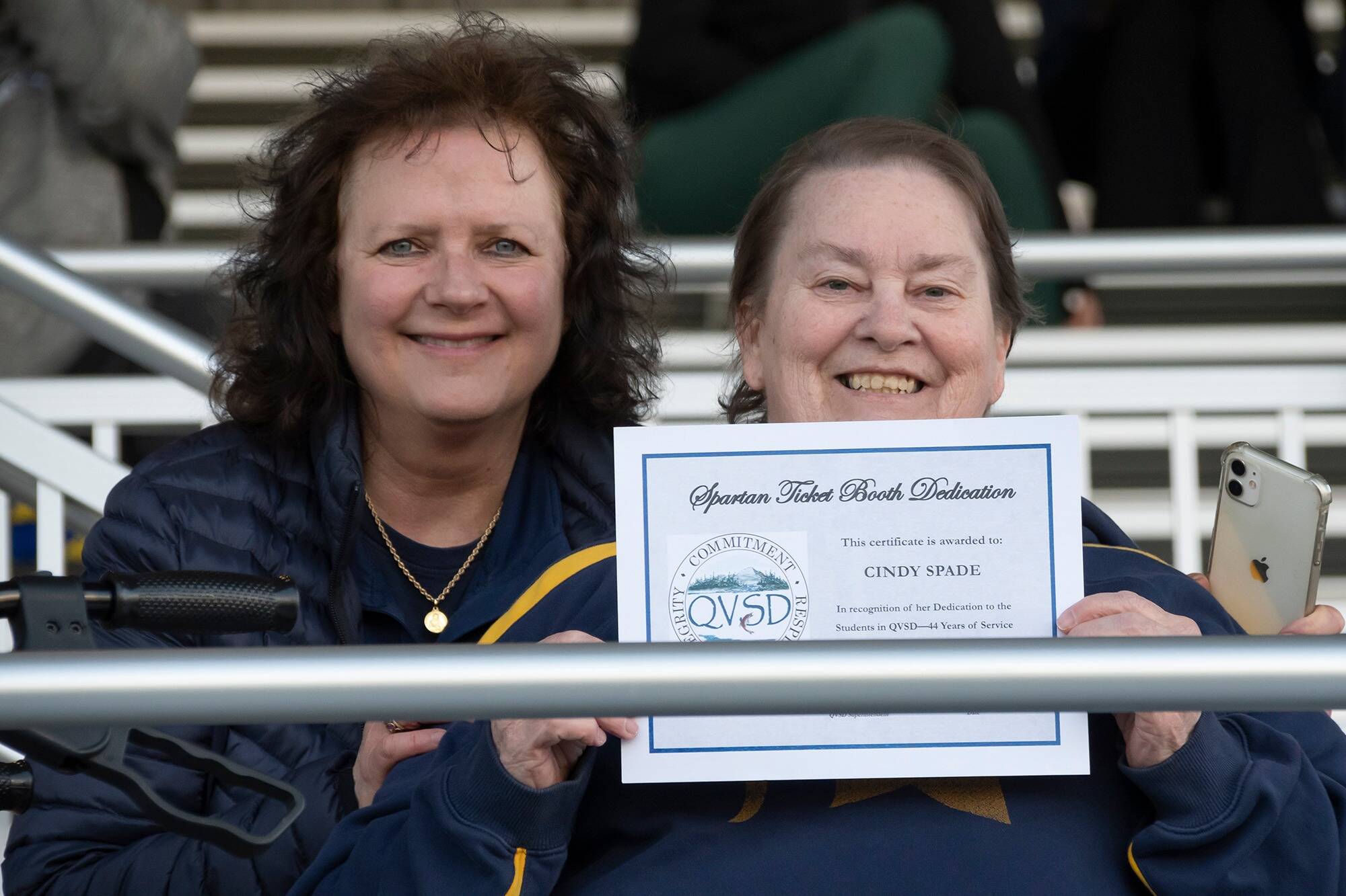 Superintendent Diana Reaume with Cindy Spade. The ticket booth was dedicated to Spade in recognition of her working the old booth for the past 44 years. Photo Kim Weissenfels