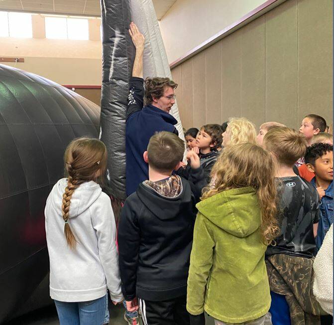 Brendan Rager (OCNMS) teaching the students about the humpback whale, Big Mama. Submitted photo
