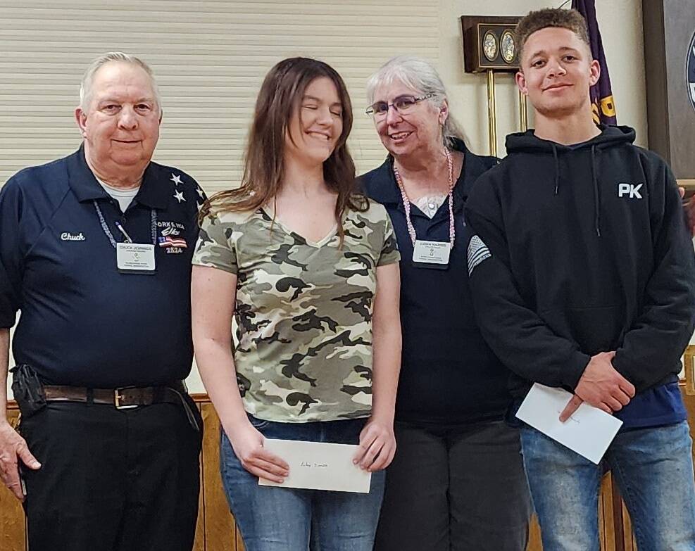p
Riley Smith and Cameron Kennedy were both winners of $2,500, seen here with Chuck Jennings, PER, and Dawn Harris local Elks ER. Submitted photo