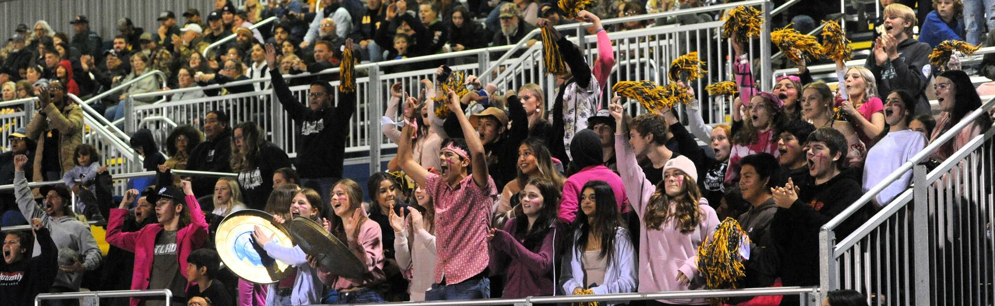 The Spartan student body cheered as the final seconds clicked off the clock giving their beloved football team a victory. Photo by Lonnie Archibald