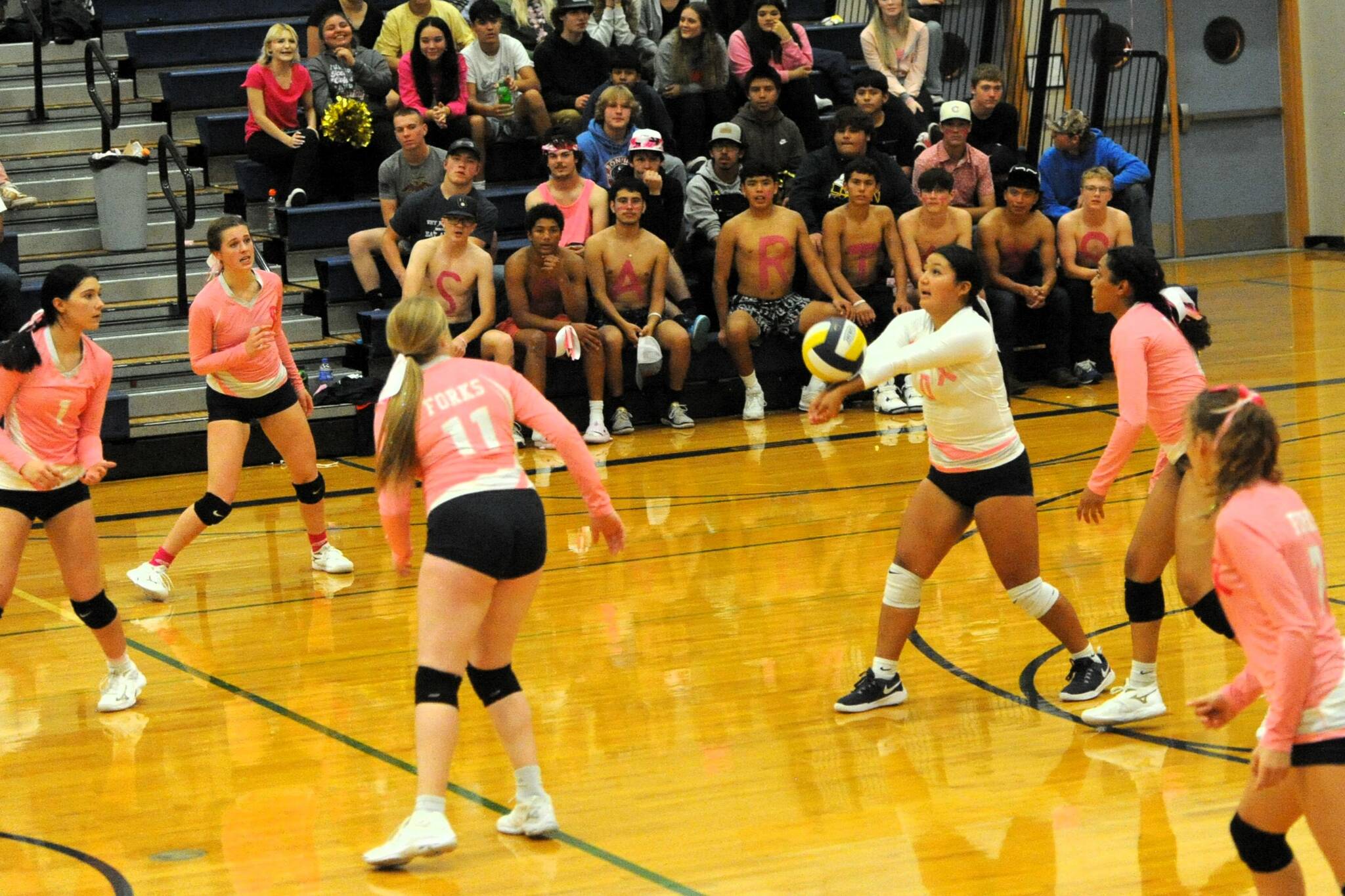 Forks’ Elizabeth Soto hits against the Ravens Oct. 17 in the Spartan Gym where Raymond-South Bend took three close sets from Forks. Also pictured are, from left, Erika Williams, Chloe Gaydeski, Keana Rowley, Eladia Hernandez-Stansbury and Karee Neel. Photo by Lonnie Archibald