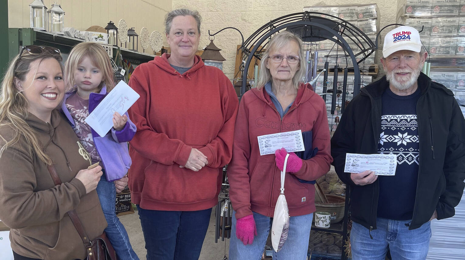 The Nov. 25 Santa Bucks drawing was held at 1 p.m. amongst the WEYL Christmas trees, outside Outftter’s Ace Hardware entrance. Santa Bucks winners were Etta Mae Baker, Misty Rockwell, and Christa Baker; other winners of Outfitter’s gift cards and Sully’s gift certificates were Queenie Black, Sarah Warner, Verlie Flores, Lisa Bishop, and Ron Tull. Pictured are Baker, Baker, Rockwell, Bishop, and Tull. Dec. 2 another $100 in Santa Bucks will be given out.
 Photo Christi Baron