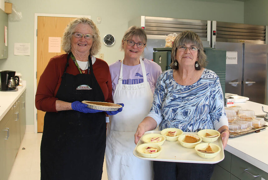 <p>Feeding 5000 volunteers Sherry Schaff, Christie Stallman, and Debbie Anderson show off some of the desserts offered at last week’s Free Lunch at the Forks Community Center. </p>
                                <p>Photo Christi Baron</p>