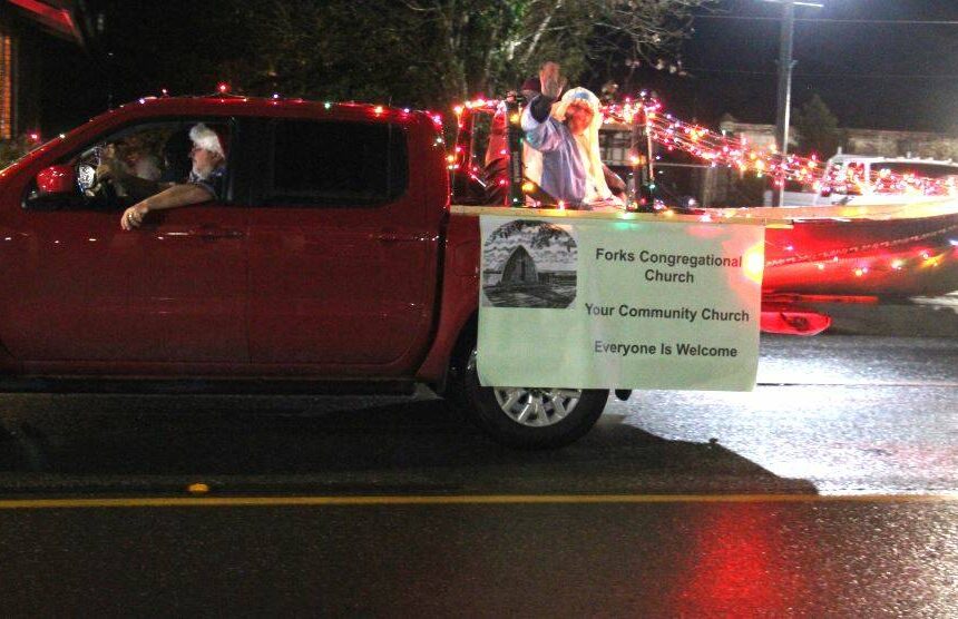 <p>The First Congregational Church joined the fun this year with its first entry in the Twinkle Light Holiday Parade.</p>