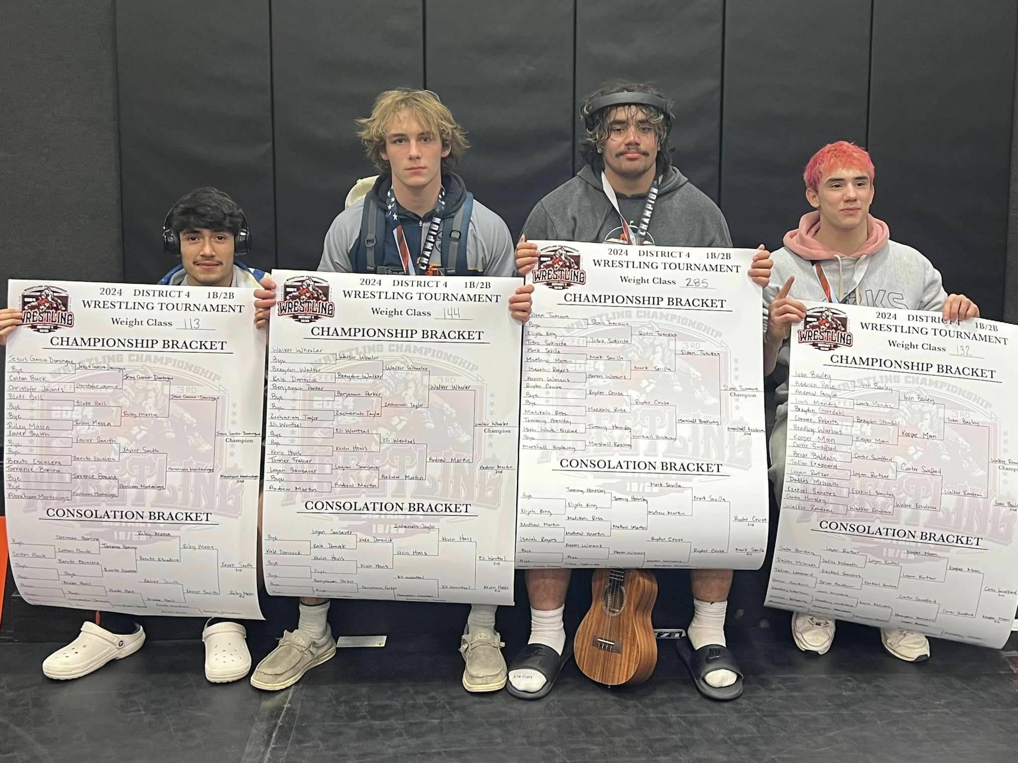 Winning championships were Jesus Garcia-Dominguez at 113 pounds, Walker Wheeler at 144 pounds, Sloan Tumaua at 285 pounds and Walker Rondeau at 132 pounds. Photo Shannon Dahlgren