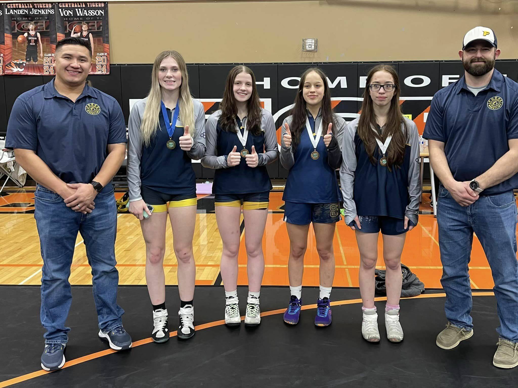 Coach Salazar, Blanton, Johnson, Horejsi, Horejsi and coach Nielson.