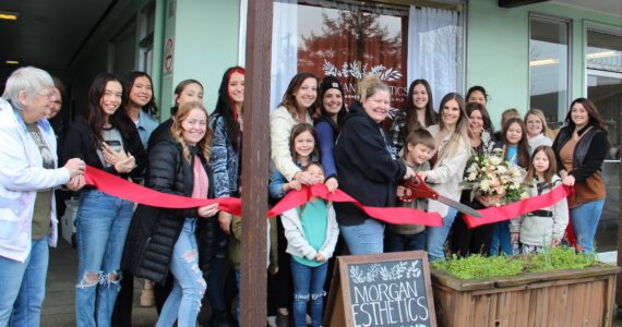 Congratulations to Morgan Gaydeski on her new business location, Morgan Esthetics, located at 164 South Forks Avenue in the Almar Building.
Friends and family joined Morgan on Saturday, March 2, at 11 a.m., for a Forks Chamber of Commerce Ribbon Cutting.
Seen center of the photo Forks Chamber Executive Director Lissy Andros, Morgan’s son, and Morgan cutting the ribbon! Then everyone was invited in for some yummy snacks.
See her website at morganesthetics.glossgenius.com/ Photo Christi Baron