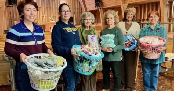The Soroptimist International of the Olympic Rain Forest gifted twelve baby layette baskets and other necessities to The Caring Place at their March meeting. Pictured Sydney Scelzi, Sarah Hansen, Rita Calamar, and Pam Cantrell from Caring Place, Elena Friesz, and Sharla Fraker. Submitted photo