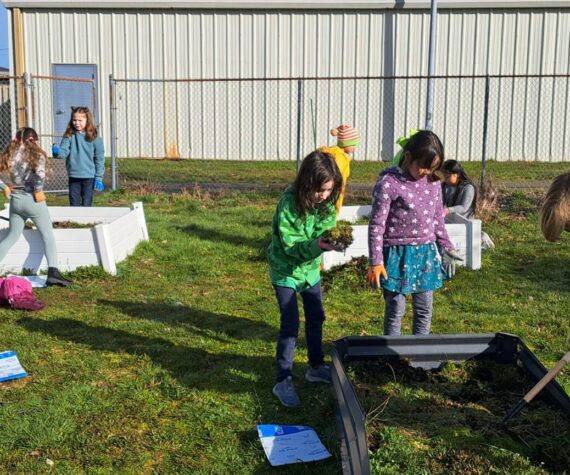 <p>Students recently took advantage of a sunny day as the began to prepare raised beds for planting. Submitted photos</p>