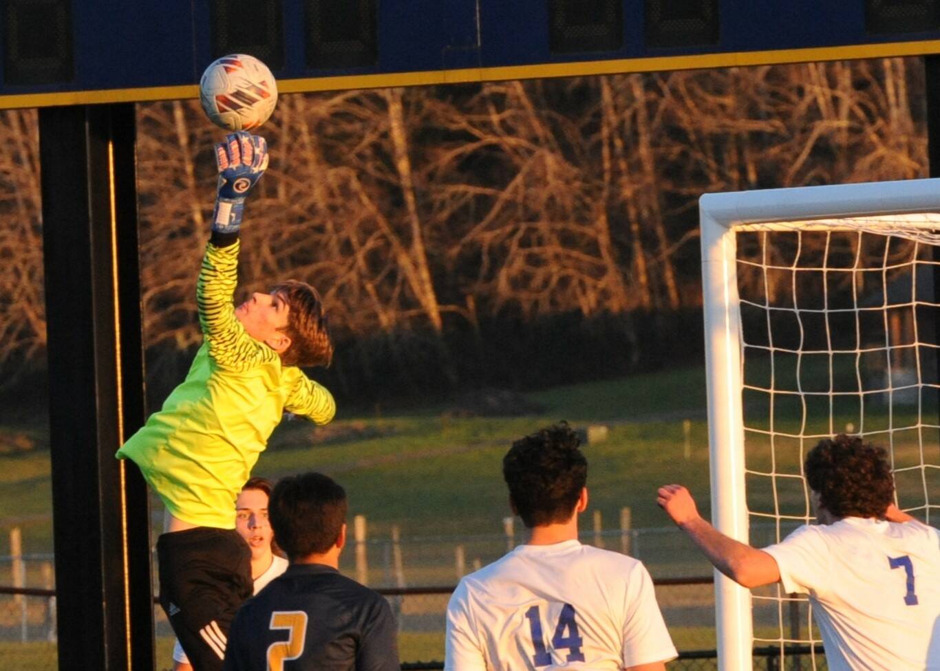 Goalie Juan Terrones makes the save in front of the net. Also shown is Estevan Ramos (2). Photo by Lonnie Archibald