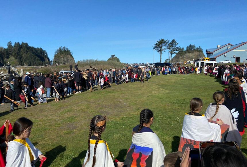 <p>What a difference a year makes …last year Quileute students, tribal members and spectators battled wind and rain at the annual Welcome the Whales ceremony …this year the weather was amazing! Here students perform a dance and song as a very large crowd looks on. Submitted photo</p>