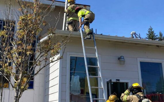 CCFPD#1 firefighters head up on the roof at Ginger’s Closet located at 170 Sol Duc Way. Submitted photo
fire