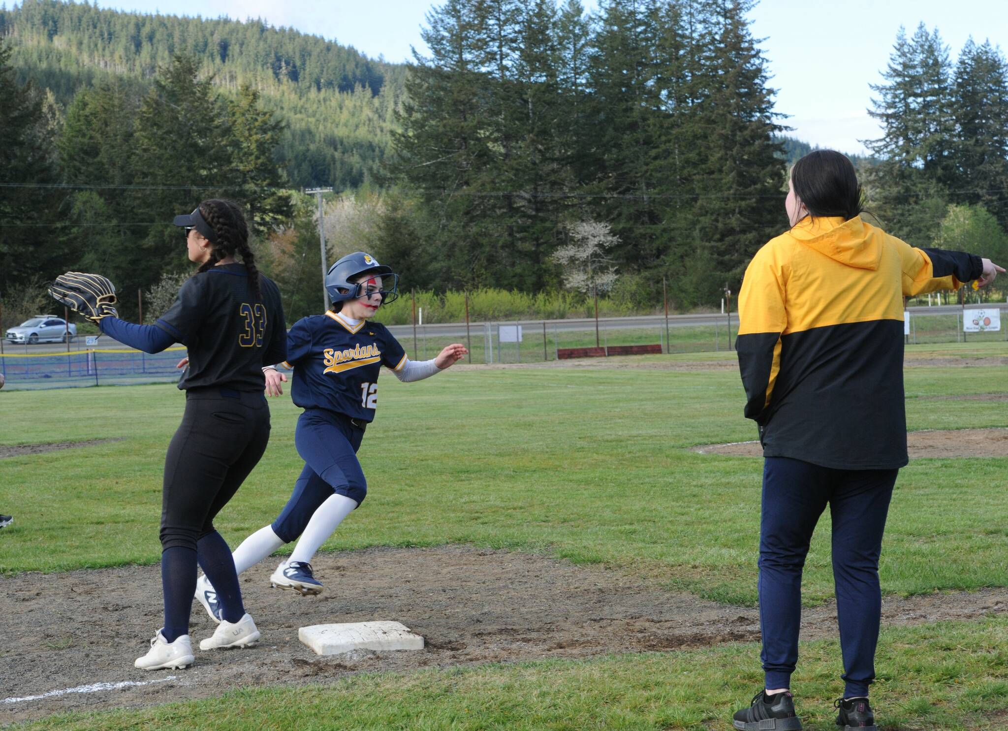 Spartan Kindley Rondeau rounds third and scores against Ilwaco during the second game of a double header with the Fishermen. Photo by Lonnie Archibald