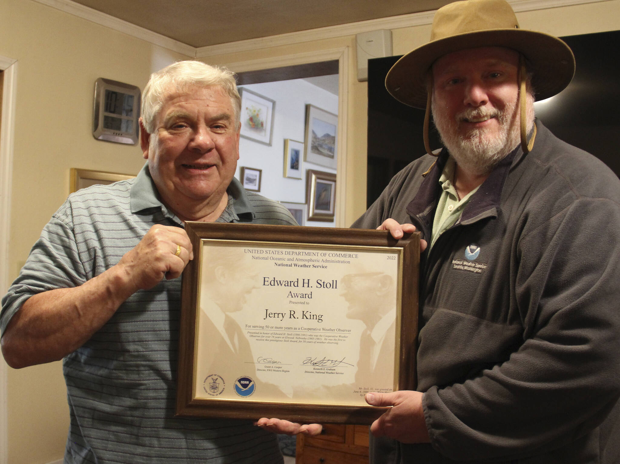 Jerry King on the left receives his latest award, the Stoll Award, recognizing his over fifty years of weather data keeping. John Burg from NOAA on the right presented the framed certificate. Photo Christi Baron