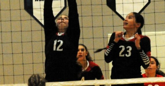 In action for the Red Devils are Lillie Yallup (12), Angel Haltunen (4), Caylee Moss (23), and Brooklynn Johnson (30).