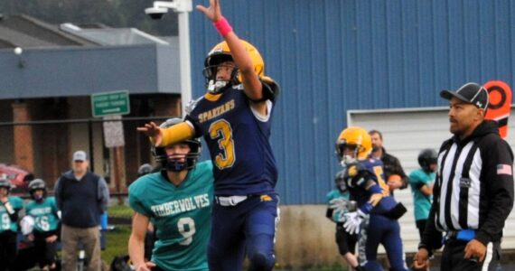Spartan Ryder Fletcher reaches for a high pass against the Timberwolves who defeated the Spartans 25 to 13 in middle school action at Spartan Stadium.
Photo by Lonnie Archibald