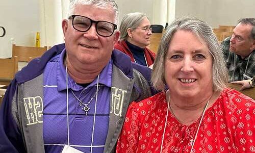 Warren Johnson is with his wife Cathy at the annual meeting.