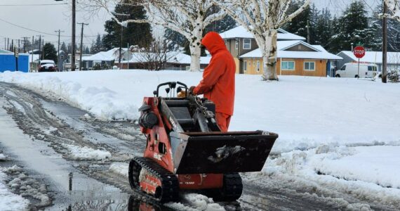 Submitted photo
City of Forks Public Works crew members kept sidewalks clear using some new equipment.