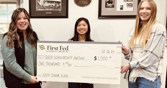 Submitted photo
First Federal in Forks wants to remind everyone it is time to start thinking about the upcoming Quillayute Valley Scholarship Auction on March 15 and 16 at the Forks High School commons. Each year, First Fed kicks off the giving with a big check! Accepting the check this year are FHS 2025 Seniors, left to right: Katelynn Wallerstedt, Moli Luong, and Faith Romberg.
These three are the 2025 Auction coordinators. Please watch for the FHS Senior class soliciting for donations. We look forward to seeing the Forks community at this year’s auction!