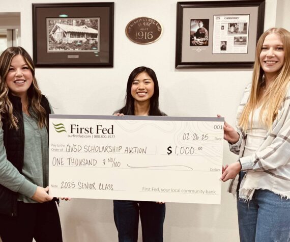 Submitted photo
First Federal in Forks wants to remind everyone it is time to start thinking about the upcoming Quillayute Valley Scholarship Auction on March 15 and 16 at the Forks High School commons. Each year, First Fed kicks off the giving with a big check! Accepting the check this year are FHS 2025 Seniors, left to right: Katelynn Wallerstedt, Moli Luong, and Faith Romberg.
These three are the 2025 Auction coordinators. Please watch for the FHS Senior class soliciting for donations. We look forward to seeing the Forks community at this year’s auction!