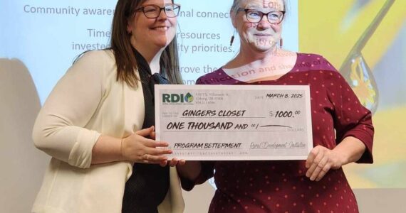 Submitted photos
Christine Gilmore, Director of Leadership and Community Engagement RDI, with Patsy Brown accepting a $1000 grant for Ginger’s Closet.