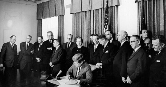 Courtesy John F. Kennedy Presidential Library and Museum
President John F. Kennedy signing legislation that allocated funds for new community mental health centers, photograph by Abbie Rowe, 1963.