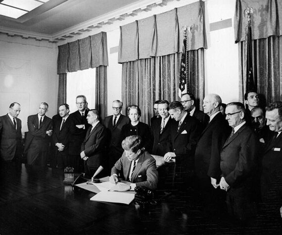 <p>Courtesy John F. Kennedy Presidential Library and Museum</p>
                                <p>President John F. Kennedy signing legislation that allocated funds for new community mental health centers, photograph by Abbie Rowe, 1963.</p>