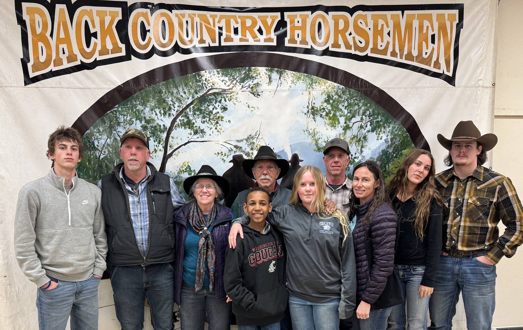 Submitted photo
Larry, center of photo, with wife Sherry to his right, are surrounded by their family on a recent evening in Ellensburg, honoring Larry’s dedication to maintaining trails for the benefit of everyone.