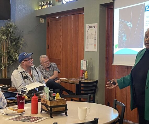 Photo Christi Baron
PUD Commissioner Phyllis Bernard shares a slide showing the cause of the recent 16 hour power outage.