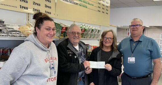Photo Christi Baron
The Forks Elks recently donated $1,500 to the Forks Food Bank from a grant they received. In addition, they recently presented a $600 donation on behalf of Monica Henry, who contributed her compensation from performing at the Elks’ 50th Anniversary party.
In the center of the photo, Glenn King of the Forks Elks presents the check to Pat Soderlind, Executive Director of the Forks Food Bank. Also pictured are Sena Engeseth, Food Bank Operations Manager (left), and Warren Johnson, Forks Food Bank Board President (right).
The Food Bank, 181 Bogachiel Way, will hold an Open House on April 3, from noon-6 p.m., Forks Chamber will offer an official Ribbon Cutting at 2 p.m. Enjoy light refreshments, explore the space, and see firsthand how the Food Bank supports the community.