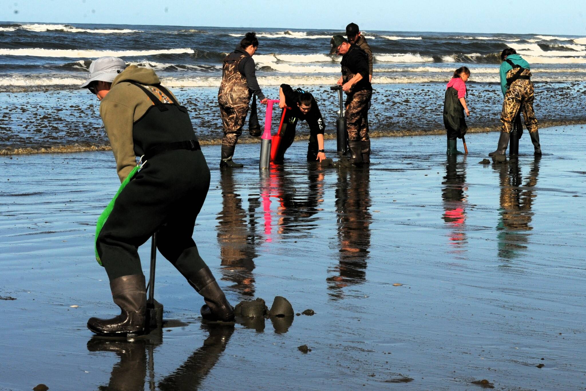 Photo by Lonnie Archibald
Clam diggers were rich in color as well as in clams as they searched for the popular razor clams at Moclips on Thursday, April 3. Good weather and the clams were showing.