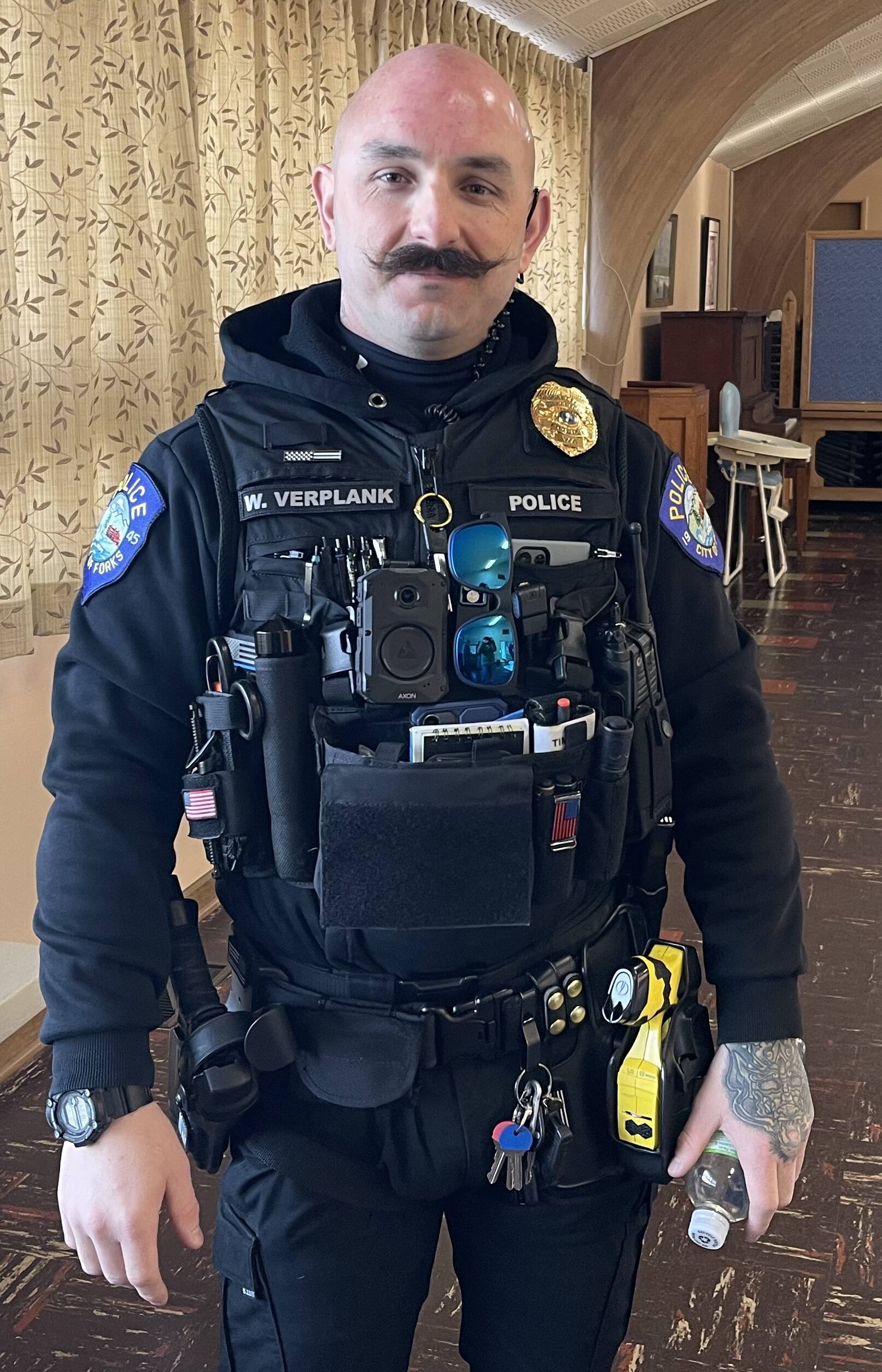 Photo Christi Baron
William Verplank has recently joined the Forks Police Department as a new officer. Police Chief Mike Rowley recently reported to the West End Business group that his department is now fully staffed. Like many coming to work here, Officer Verplank desperately needs a rental. If anyone has anything, call the FPD.