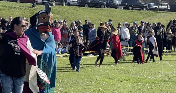 Photos Christi Baron
Students from the Quileute Tribal School perform the 18th annual Welcoming the Whale ceremony at First Beach in La Push on Friday. Under sunny skies and before a large crowd, the event honored the gray whales spring migration with traditional songs, dances, and offerings — a tradition begun by the Quileute Tribe in 2007. While no whales appeared during the ceremony, their passage through Quileute waters is part of their annual journey between Mexico and the Arctic.