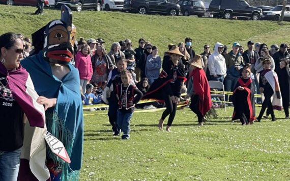 Photos Christi Baron
Students from the Quileute Tribal School perform the 18th annual Welcoming the Whale ceremony at First Beach in La Push on Friday. Under sunny skies and before a large crowd, the event honored the gray whales spring migration with traditional songs, dances, and offerings — a tradition begun by the Quileute Tribe in 2007. While no whales appeared during the ceremony, their passage through Quileute waters is part of their annual journey between Mexico and the Arctic.