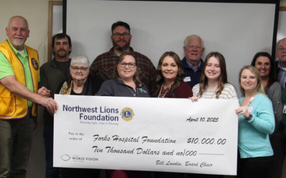 Last week members of the Northwest Lions Foundation and local Lions gathered to award the Forks Hospital Foundation a check for $10,000 to benefit the ongoing fundraising efforts for a new mammography unit.
Seen in the photo are Forks Community Hospital CEO Heidi Anderson, Mike Dukes Lions Foundation Trustee, District 19–L, from the Clallam Bay Sekiu Lions Club, Forks Lions Club members Javier Contreras and Elliot Mann, Gary Reidel Lions Foundation Secretary/Treasurer, from the Port Angeles Lions Club, District 19–L, Bill Lundin Foundation Chairman of the Board, from the Hazel Dell Lions Club, District 19–N, Vancouver, WA.
Linda Lundin, FCH Foundation members Kim Hull, Shilo Salsgiver, Jenna Gates, Halie Fletcher, Laci Johnson and Tabetha Gaydeski.
Photo Christi Baron
