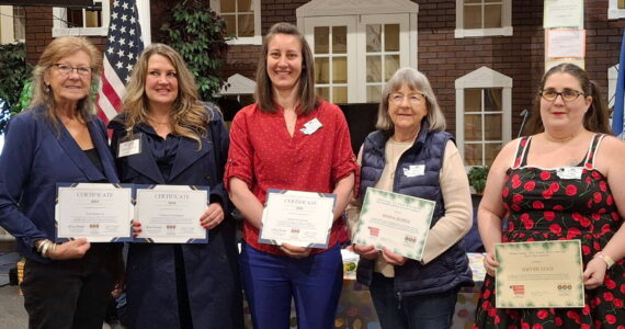 Pictured are the Michael Trebert DAR Members who chaired as Location Coordinators (“LC” at each cemetery), who were honored at a recent meeting. (L-R: Gardiner Cemetery LC: Trish Bekkevar; Forks Cemetery LC: Lindsey Christianson; Mount Angeles LC Amira-Lee Salavati; Blue Mountain LC Cemetery: Donna Bower and Gwynn Oden Ocean View LC Cemetery. (Not pictured, Diane Cox Dungeness LC Cemetery and Anita Reynolds LC Sequim View Cemetery).