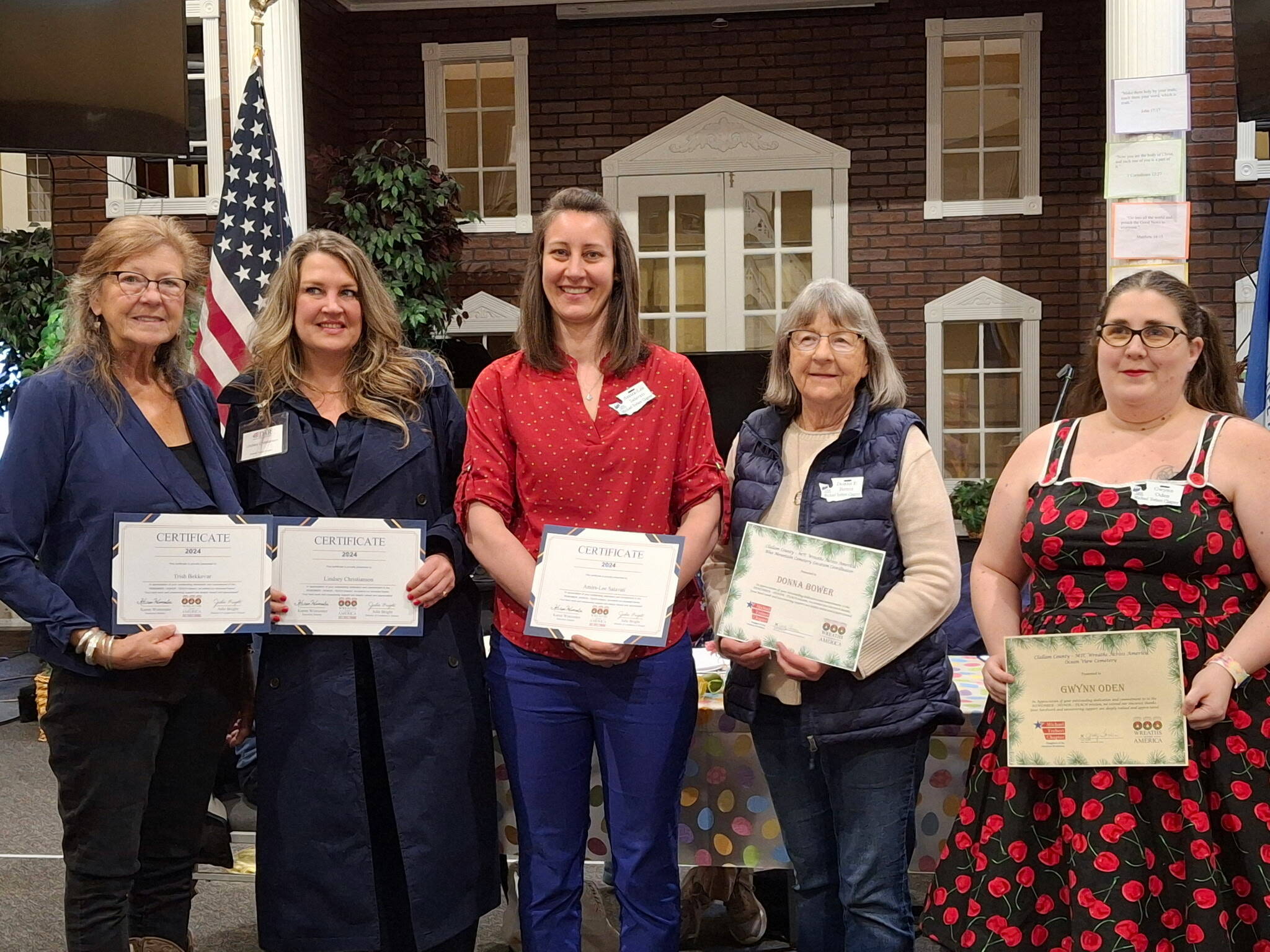 Pictured are the Michael Trebert DAR Members who chaired as Location Coordinators (“LC” at each cemetery), who were honored at a recent meeting. (L-R: Gardiner Cemetery LC: Trish Bekkevar; Forks Cemetery LC: Lindsey Christianson; Mount Angeles LC Amira-Lee Salavati; Blue Mountain LC Cemetery: Donna Bower and Gwynn Oden Ocean View LC Cemetery. (Not pictured, Diane Cox Dungeness LC Cemetery and Anita Reynolds LC Sequim View Cemetery).