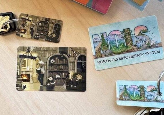<p>Submitted photo</p>
                                <p>NOLS has new library cards featuring a digital illustration by Lance Snider (left) and a watercolor and ink landscape by Sarah Necco (right).</p>