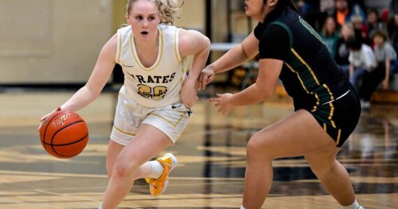 Peninsula Pirates Athletic Department
Pirate guard Kadie Wood handling the ball in a game against Shoreline. Wood scored 10 points.