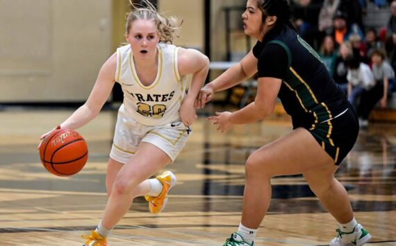 Peninsula Pirates Athletic Department
Pirate guard Kadie Wood handling the ball in a game against Shoreline. Wood scored 10 points.