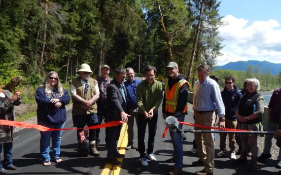 And the ribbon is cut, Thursday, May 8, by Governor Bob Ferguson, offcially re-opening the Upper Hoh Road and access to the Hoh Rain Forest. Photo Christi Baron