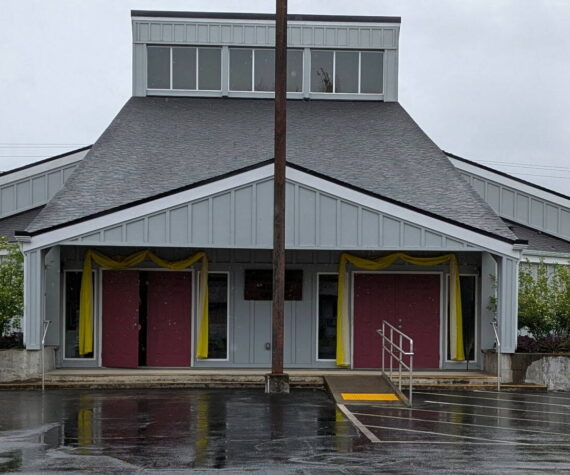 Yellow bunting adorns the entrances of St. Anne Catholic Church, 511 5th Avenue, bringing brightness to a rainy day and symbolizing the joyful beginning of a new papacy. As a sign of celebration and hope, it marks the leadership of Pope Leo XIV and a renewed spirit for the future. Submitted photo